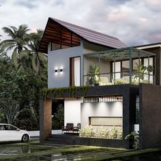 a car is parked in front of a house with balconies and plants on the roof