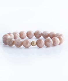 Add some shimmer to your life with our Gemstone Bracelet, featuring 10mm Sunstone beads. This playful piece adds a touch of whimsy to any outfit. Enjoy the potential benefits of Sunstone, known for bringing joy and positivity into your day. Shine on! Add to your bracelet stack with this gorgeous amazonite gemstone bracelet. 10mm Sunstone gemstone Stretch to fit Sunstone Bracelet, Shine On, Gift Accessories, Bracelet Stack, Gemstone Bracelet, Clothes Gift, Paper Clip, Sales Gifts, Jewelry Sales