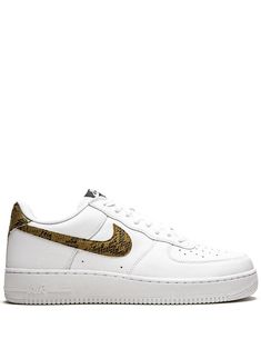 Supplied by a premier sneaker marketplace dealing with unworn, already sold out, in demand rarities. Each product is rigorously inspected by experienced experts guaranteeing authenticity. The Air Force is not just for the president. These white, elemental gold and dark haze Air Force 1 sneakers from Nike will have you feeling like a big deal, thanks to their classic silhouette and updated animal pattern detailing. Fly high. Featuring a round toe, a flat rubber sole, a lace fastening, a signature Nike T, Fancy Shoes, Nike Air Force 1 Low, Air Force 1 Low, Sportswear Brand, Snakeskin Print, Low Sneakers, Nike Air Force 1, Nike Air Force Sneaker