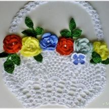 a crocheted purse with flowers on it