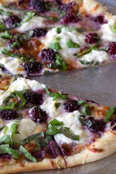 a close up of a pizza on a pan