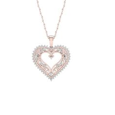 Feminine yet sophisticated, this vintage inspired diamond heart pendant is sure to please. Crafted in 10k rose gold, this pendant features a heart shaped frame completely outlined with shimmering diamonds. Inside the frame, an intricate filigree pattern touched with diamonds complete the look. A luxurious look, this pendant captivates with its design and diamonds. Finished with a polished shine, this pendant suspends along an 18 inch rope chain that secures with a spring ring clasp. Size: one si Filigree Pendant Necklace, Heart Shaped Frame, Filigree Heart, Filigree Pattern, Solitaire Pendant Necklace, Filigree Pendant, Heart Pendant Diamond, Gold Filigree, Diamond Pendant Necklace