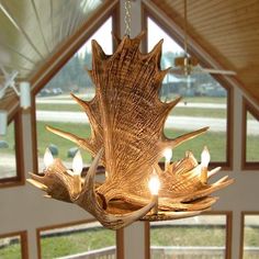 Moose 4 Horn Chandelier Antler Chandelier Dining Room, Horn Chandelier, Log Home Living Room, Barn Beam Lighting, Beam Lighting, Antler Chandeliers, Rustic Family Room, Antler Lights, Rustic Decorating