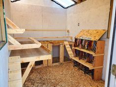 the inside of a storage room with wooden shelves