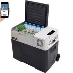 a cooler with six bottles in it and a cell phone showing the app on its side