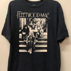 a black t - shirt with an image of the band fleetwood on it