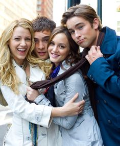 three young people are posing for the camera with their arms around each other and smiling