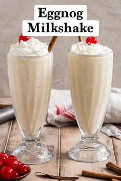 eggnog milkshake with whipped cream and cherries on the rims