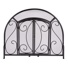 PRICES MAY VARY. BLACK WROUGHT IRON FINISH: A sturdy iron frame in with natural texture for a hand-crafted touch. PROTECTIVE MESH: Heavy gauge steel mesh provides an easy-cleaning surface and a see-through barrier to trap sparks and embers. CLASSIC DESIGN: Elegant inset doors designed with orante scrolls to compliment most decor. SIMPLE ASSEMBLY: Piece together in under 5 minutes. OVERALL DIMENSIONS: 40 x 32 x 8.5 inches, Frame Depth (3/4"), Screen Gauge (.03") Mediterranean Fireplace, Ornate Fireplace, Wrought Iron Fireplace Screen, Wrought Iron Scrollwork, Fireplace Screens With Doors, Simple Fireplace, Fireplace Entertainment, Wall Mount Electric Fireplace, Arched Doors