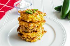 a stack of food sitting on top of a white plate