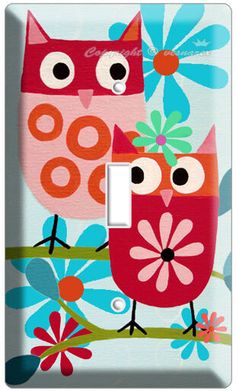 two owls sitting on a branch with flowers and daisies light switch plate cover by creative outlet