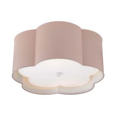 a ceiling light with a pink shade on it