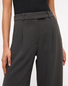 High rise pants in our elevated premium crepe fabric and ultra-wide leg silhouette, that has a slightly fuller leg shape than our Sloane pant. Features a clean fixed waistband, figure-flattering pleat detail, pockets and a functional zipper. Modern Wide Leg Bottoms With Pressed Crease, Modern Wide Leg Pants With Pressed Crease, Modern Wide Leg Elastane Pants, Wide Leg Elastane Pants With Belt Loops, Women's Bottoms, Ultra Wide, High Rise Pants, Crepe Fabric, Abercrombie Fitch