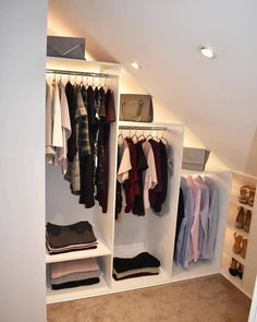 the closet is full of clothes and shoes