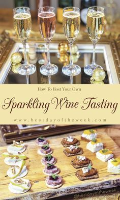 a wooden tray topped with wine glasses filled with desserts and pastries on top of a table