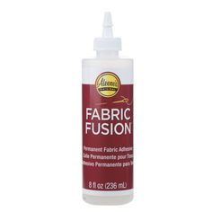 a bottle of fabric fusion on a white background