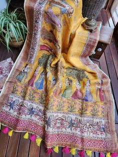 Update! - Zynah covered by LBB - https://lbb.in/bangalore/zynah-designs-handloom-sarees/ Introducing our Yellow Organic Linen Saree, a magnificent masterpiece that seamlessly marries traditional and contemporary styles. 🎨 Pichwai Print: Adorned with a stunning Pichwai print, this saree captures the essence of Indian artistry, adding a touch of culture to your attire. 🌟 Delicate Zari Border: The delicate zari border infuses an air of elegance and sophistication, elevating your look for any occasion. 🌿 Organic Linen Comfort: Crafted from organic linen, this saree is not only beautiful but also incredibly comfortable. Its light and breathable texture ensures all-day comfort. Whether you're gracing a wedding, attending a formal event, or simply desiring to make a statement, this saree promi Bohemian Yellow Traditional Wear With Printed Motifs, Bohemian Yellow Saree With Printed Motifs, Bohemian Blouse Piece With Printed Motifs For Festivals, Bohemian Yellow Chanderi Blouse Piece, Yellow Bohemian Semi-stitched Blouse Piece, Bohemian Yellow Blouse Piece With Traditional Drape, Bohemian Yellow Blouse Piece For Festivals, Yellow Semi-stitched Bohemian Saree, Yellow Bohemian Semi-stitched Saree