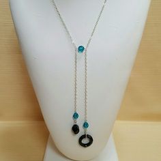 This Couture Lariat Is Simply Gorgeous! It Has A Fine Sparkly Elegant Sterling Silver Cable Chain, Black Swarovski Crystal Cosmic Ring, Black Helix Crystal Bead And Blue Zircon (Teal) Swarovski Crystals. Necklace Is About 28.5 Inches Long. Fabulous With Red, Mustard, Black Or All White. Earrings Not Included But Available In My Boutique. Beaded Lariat Necklace Diy, Lariat Necklace Diy, Cosmic Ring, Beaded Stuff, Crystals Necklace, Jewerly Beads, Necklace Ideas, Diy Wire Jewelry, Homemade Jewelry