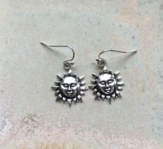 "☀️ Sun earrings, sun lover gift, statement suns for your ears, Tibetan silver sun earrings, perfect for summer, holidays or sun lovers! ☀️ I've made these using Tibetan silver charms hung from good quality silver plated earrings. ☀️ There's plenty of detail and they make a brilliant present or a summery treat for yourself. ☀️ Sun measures approximately 3/4\" (2 cm) long from the top of the hanging hoop. ☀️ I post out the same day or worst case scenario the next, unless it's the weekend then it' Sterling Silver Earrings For Everyday Summer Wear, Everyday Summer Pierced Earrings, Summer Everyday Pierced Earrings, Sunburst Shaped Jewelry As Summer Gift, Sunburst Shape Summer Gift Jewelry, Summer Sunburst Jewelry Gift, Hypoallergenic Round Summer Earrings, Hypoallergenic Round Earrings For Summer, Summer Sun Design Jewelry Gift