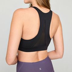 Featuring a flattering V-neck and racerback style, this Xersion women's sports bra is an essential for your active wardrobe. It's made from stretch-knit with moisture-wicking properties and offers medium support. Wear it with leggings and sneakers. Bra Type: SportsFeatures: Moisture WickingClosure Type: Pullover HeadSupport: Medium SupportFiber Content: 78% Polyester, 22% SpandexFabric Description: KnitLining Material: Spandex, NylonCare: Machine Wash, Tumble DryCountry of Origin: Imported