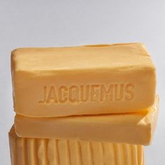 a bar of soap with the word jacquemus written on it's side