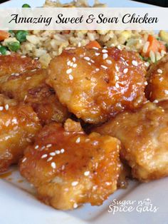 an image of chicken with sesame seeds and rice on a plate that says amazing sweet and sour chicken