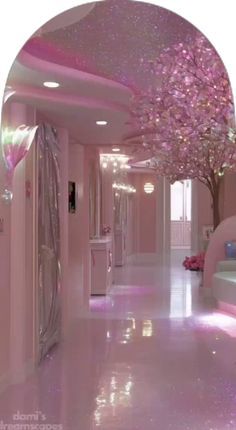 a pink room with white walls and flooring is decorated in glamorous colors