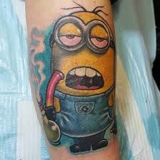 a cartoon character tattoo on the arm