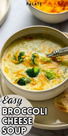 broccoli cheese soup in a white bowl on a plate with bread and crackers