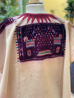 Beautiful huipil with intricate Guatemalan motifs for use by cofrades in the traditional purple used for ceremonies . This huipil is circa 1970 . The huipil was made in Chichi by local artisans in charge of religious affairs. This huipil was hand woven on a back strap loom in white cotton base panel and silk thread. The hand embroidered collar is unique to these huipils and this example is particularly fine. Is an beautiful piece although pre loved it keeps it bright color, it has some bleed fro Traditional Purple Kaftan For Festive Occasions, Purple Bohemian Festive Kaftan, Bohemian Purple Kaftan For Festive Occasions, Purple Bohemian Kaftan For Festive Occasions, Bohemian Handloom Kaftan For Traditional Ceremonies, Handloom Bohemian Kaftan For Traditional Ceremonies, Traditional Kaftan With Woven Motifs For Festival, Festival Multicolor Embroidered Kaftan With Woven Motifs, Festival Kaftan With Multicolor Embroidery And Woven Motifs