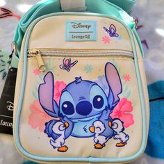 Awesome Disney Stitch Crossbody Bag. It Has A Large Zipper Compartment And A Small Zipper Compartment On The Front And A Adjustable Strap. Great For Everyday Use Or For Travel. Disney Blue Shoulder Bag For Travel, Disney Crossbody Bags For Disney Trips, Disney Style Crossbody Bags For Disney Trips, Blue Disney Bag With Zipper Closure, Disney Blue Bags With Zipper Closure, Blue Disney Bags With Zipper Closure, Disney Shoulder Bag For School With Adjustable Strap, Disney Style Shoulder Bag With Removable Pouch, Cute Blue Bag For Disney Fan Events