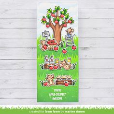 an apple tree with some stickers on it