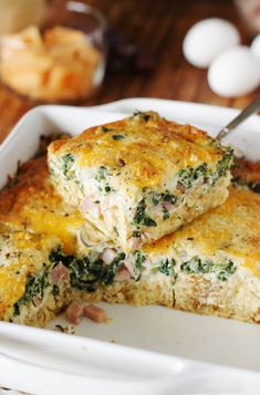 two pieces of quiche sitting in a white dish