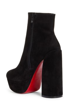 Pre-order this style today! Add to Shopping Bag to view approximate ship date. You'll be charged only when your item ships.A chunkier-than-most platform and lofty sculptural heel provide statement-making lift for this sleek ankle boot crafted of supple calfskin suede. Christian Louboutin's iconic red sole—born from a fateful brush with nail lacquer—adds a burst of signature color to every step. 5" (127mm) heel; 1 1/2" platform (size 38.5) 5" shaft Side zip closure Wipe with a soft, dry cloth and Chic High Cut Leather Heeled Boots, Chic High-cut Leather Heeled Boots, Suede High Ankle Platform Boots For Party, Evening Ankle Platform Boots With Sculpted Heel, Modern Platform Boots With Sculpted Block Heel, Modern High Ankle Platform Heeled Boots, Modern High Cut Platform Boots, Modern High-cut Platform Boots, Modern Suede High Ankle Boots