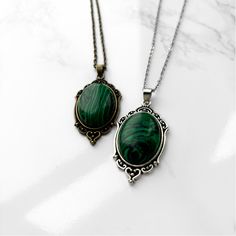 Malachite Pendant Necklace | Antique Silver or Gold | 24" Chain Clairvoyance + Transformation + Road Opener + Emotional Balance Carry your intentions wherever you go with a handmade Malachite pendant necklace. Each pendant is custom made with an antique gold or silver filigree base and comes with an 24" chain with lobster clasp fastening. Malachite is often referred to as the Stone of Transformation. It was a stone favored by the ancient Greeks and Egyptians for its protective and healing properties. Malachite is a heart chakra stone that works by removing whatever is blocking growth in your life and opening your heart and mind to new possibilities. Whether you are ready to take a leap of faith or feeling stagnant in life, this stone will give you clarity of purpose and the courage to move Oval Malachite Necklace As Gift, Vintage Malachite Jewelry For Gifts, Vintage Malachite Jewelry Gift, Feeling Stagnant, Road Opener, Opening Your Heart, Take A Leap Of Faith, Take A Leap, The Poison