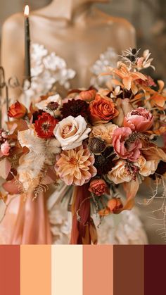 a bridal bouquet with oranges, pinks and browns