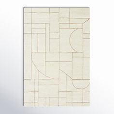 a white rug with an abstract design on it