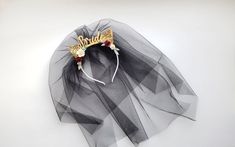 Bachelorette crown Bride To Be Headband Black veil headband Bride party headband Bachelorette Party Headband Bridal Shower Headband Bridal Shower Gift gothic crown Party gift Party bow Black gothic headband Gothic party crown Gothic bride headbandStylish bride headband in black with ears and sash!!! The veil has several layers of tulle, and lenght 35 cm. The veil is available in all colors according to the color chart! Specify the color when ordering!Height of letters 1.18 in (3 cm)Sash paramete Black Crown Headband For Party, Halloween Party Crown Headband, Bridal Shower Headband, Bachelorette Party Headband, Bachelorette Crown, Shower Headband, Veil Headband, Headband Bride, Gothic Party