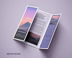 an open brochure with mountains in the background and text below it that reads, create not included