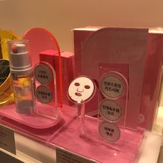 an assortment of beauty products on display in a store