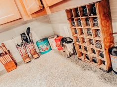 the kitchen counter is covered with spice and utensils