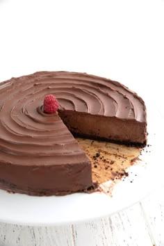 a chocolate cake with a slice missing from it