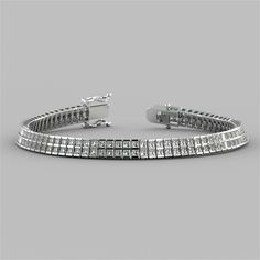 Give the ideal gift to your special someone with this refined Silver Tennis Bracelet. A double row of channel set princess cut Simulated Diamonds with a total weight of 9.84Ctw shine brilliantly as they cascade down your wrist. Enclosed by a box clasp to ensure your precious piece is always secure. Chose the perfect token of your love today. 9.84Ctw Princess Cut Double Tier Tennis Bracelet Stone Clarity: VVS-1 Available in: 925 Sterling Silver  length: 7 inches Model: B2885A-SL Bracelet Stone, Box Clasp, Channel Set, Tennis Bracelet, Lab Diamonds, Princess Cut, Bracelet Set, Bracelet Making, Ideal Gift