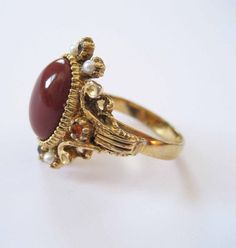 ART Signed Brick Red Lucite Ring, Adjustable Vintage Brass Cabochon Rings, Vintage Gold Ruby Ring Collectible, Vintage Collectible Ruby Ring, Vintage Gold Rings With Stone Setting, Vintage Ruby Ring For Anniversary, Ornate Gold Cabochon Rings, Ornate Gold Rings With Cabochon, Vintage Gold Ruby Ring For Gift, Vintage Bronze Wedding Rings