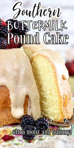 a bundt cake with frosting and berries on top