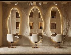 three white chairs sitting in front of a wall with mirrors on it's sides