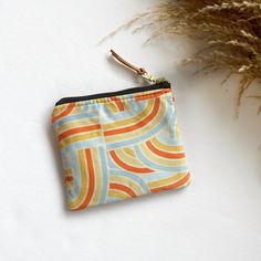 "Stash your odds and ends with this adorable square mini zipped pouch! As beautiful as it is functional, these bags are perfect for travel or everyday use! A mini first aid kit, a manicure set, jewelry holder or small makeup bag - it can be used for any organizational purpose!  Buy it for yourself or as a thoughtful gift to a friend or a family member! Makes a great gift paired with a gift card holder.  Specs: Approx 5\"x4\" Metall ykk zipper  Zipper is accented with a leather pull tag Lined with a coordinating cotton print  Machine Washable, hang dry" Mini First Aid Kit, Mini Makeup Bag, Small Makeup Bag, Lipstick Bag, Mini Pouch, Mini Makeup, Mini One, Small Makeup, Set Jewelry