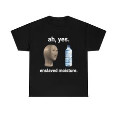 a black t - shirt with an image of a mannequin head next to a bottle of water