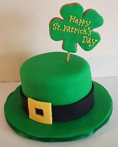 a green cake with a shamrock on top