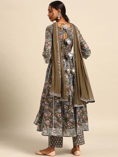 This is a beautiful 3-piece set. The set comes with floral print & gota patti detailing angrakha kurta has round neck, calf length and 3/4th sleeves teamed with printed trouser pants and a chiffon dupatta. Total No of Set-3 Kurta Fabric: Cotton Bottom Fabric - Cotton Dupatta Fabric-Chiffon Work Done - Gota Patti & Print Detailing. Sleeve Length: 3/4th Sleeves Color: Green Occasion: Party Wear Washing Instructions: Hand Wash or Dry Clean Diwali Floral Print Sets With Straight Kurta, Festive Straight Kurta Set With Floral Print, Bollywood Style Floral Print Sets For Eid, Bollywood Semi-stitched Sets With Floral Print, Anarkali Palazzo Set With Straight Kurta And Floral Print, Festive Floral Print Straight Kurta Set, Straight Kurta Anarkali Set With Floral Print For Festivals, Chanderi Floral Print Straight Kurta Sets, Diwali Floral Print Georgette Sets